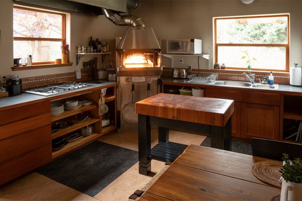 Farmhouse Suite kitchen with Wood Stone oven